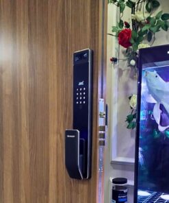 SHARP S5FV Smart Lock on a Residential Wooden Door